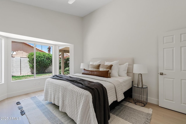 732 W Sagebrush St, Gilbert, AZ 85233 - bedroom with baseboards and light wood-type flooring