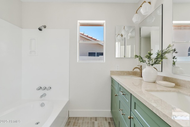 732 W Sagebrush St, Gilbert, AZ 85233 - bathroom with double vanity, baseboards, and a tub