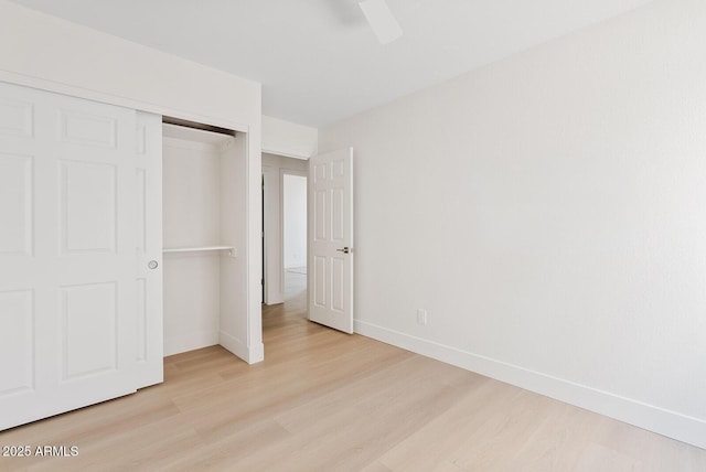 732 W Sagebrush St, Gilbert, AZ 85233 - unfurnished bedroom with light wood-type flooring, baseboards, a closet, and ceiling fan