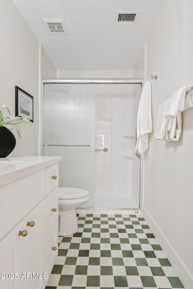 732 W Sagebrush St, Gilbert, AZ 85233 - full bathroom featuring tile patterned floors, a stall shower, toilet, and vanity