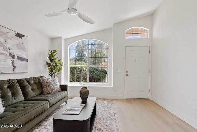 732 W Sagebrush St, Gilbert, AZ 85233 - living area featuring healthy amount of natural light, light wood finished floors, a ceiling fan, and baseboards
