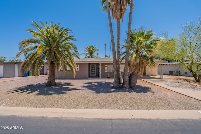 1124 S Longwood Loop, Mesa, AZ 85208 - view of front facade with concrete driveway, a carport, and covered porch