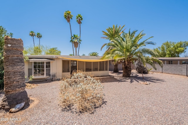 1124 S Longwood Loop, Mesa, AZ 85208 - rear view of house featuring a sunroom