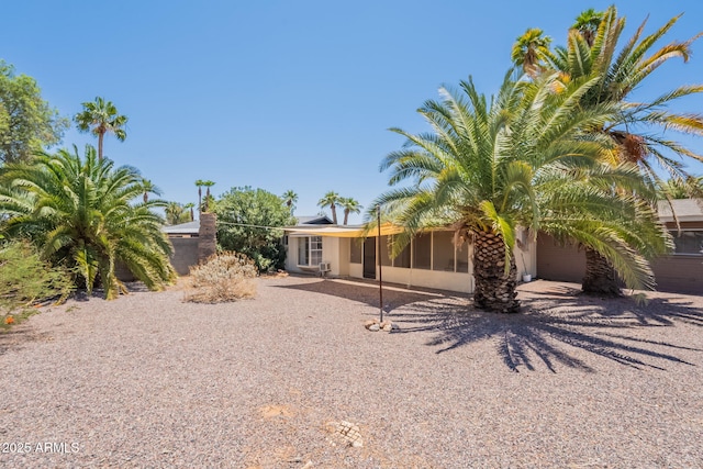 1124 S Longwood Loop, Mesa, AZ 85208 - rear view of house featuring a sunroom