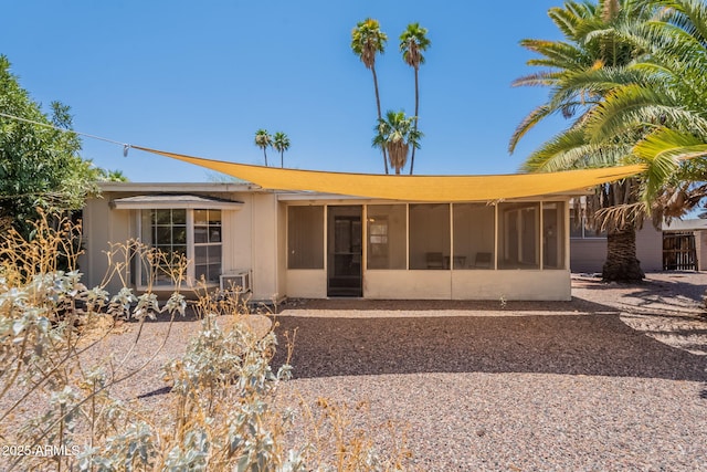 1124 S Longwood Loop, Mesa, AZ 85208 - rear view of house with a sunroom