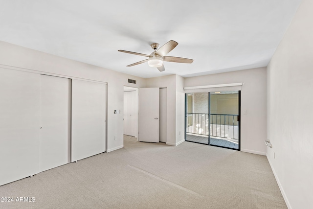 7385 E Pleasant Run, Scottsdale, AZ 85258 - unfurnished bedroom featuring carpet, ceiling fan, and access to exterior