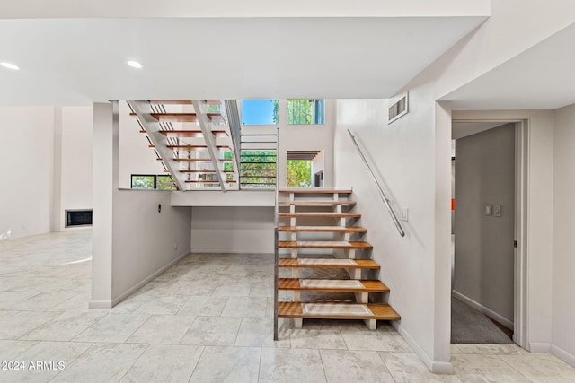 7385 E Pleasant Run, Scottsdale, AZ 85258 - stairs with baseboards and recessed lighting