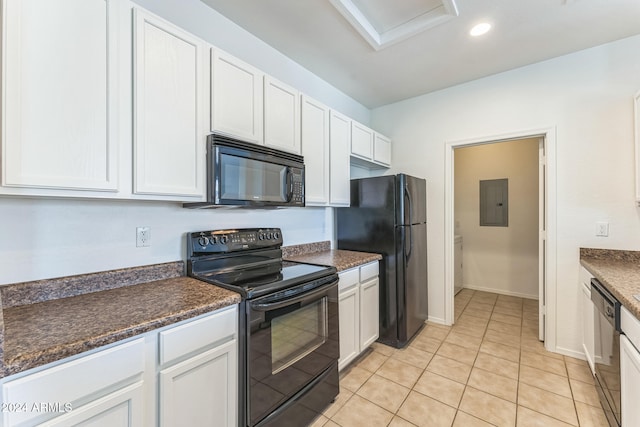 kitchen featuring electric panel, dark stone countertops, white cabinets, black appliances, and light tile patterned floors