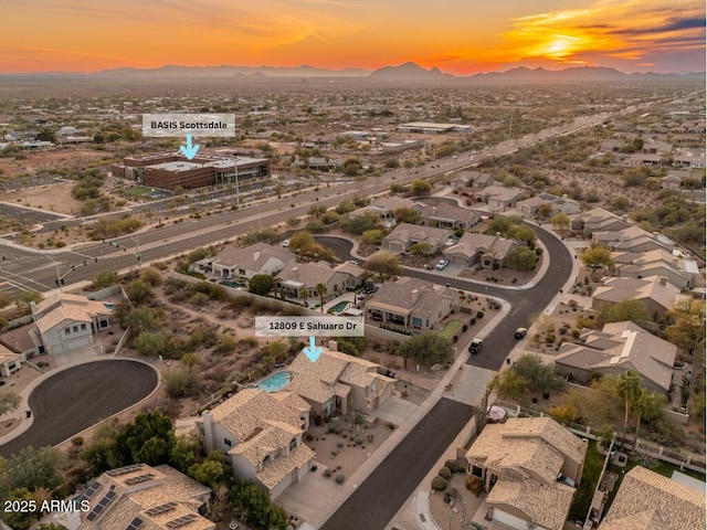 aerial view at dusk with a mountain view