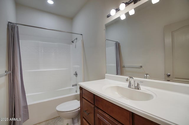 bathroom with tile patterned flooring, shower / bath combo, vanity, and toilet