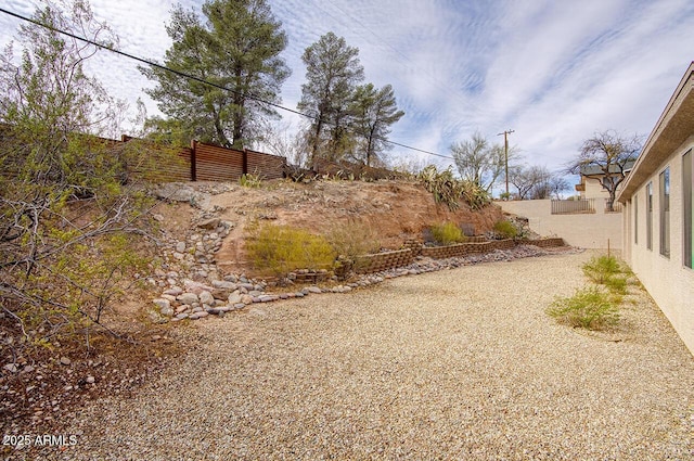 view of yard featuring fence