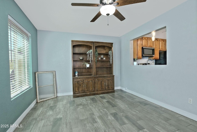 927 N Somerset Cir, Mesa, AZ 85205 - dining room with a ceiling fan and light wood-style flooring