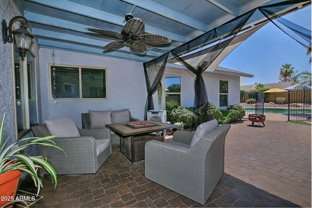 927 N Somerset Cir, Mesa, AZ 85205 - view of patio / terrace with an outdoor fire pit and a ceiling fan