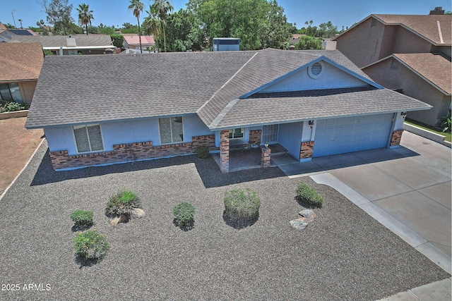927 N Somerset Cir, Mesa, AZ 85205 - ranch-style house featuring a shingled roof, stucco siding, and an attached garage
