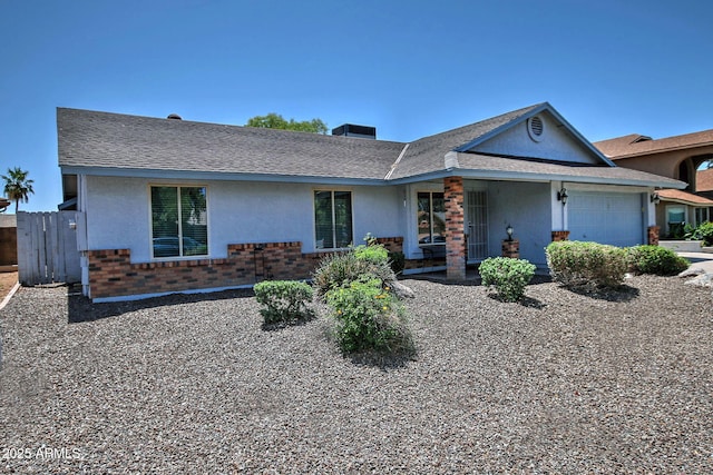 927 N Somerset Cir, Mesa, AZ 85205 - view of front of property featuring a garage, brick siding, and stucco siding