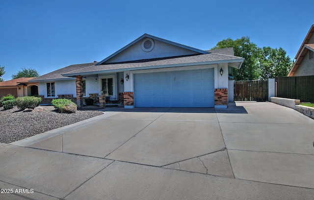 927 N Somerset Cir, Mesa, AZ 85205 - ranch-style house featuring concrete driveway, a garage, brick siding, stucco siding, and roof with shingles