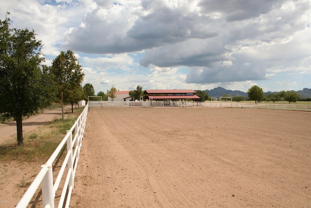 surrounding community with a mountain view and a rural view