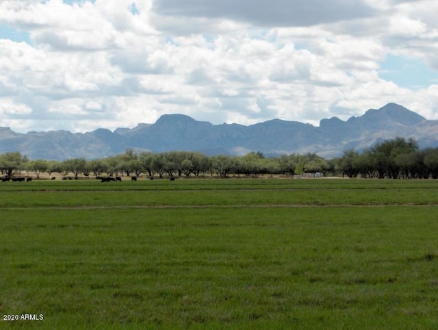 mountain view featuring a rural view