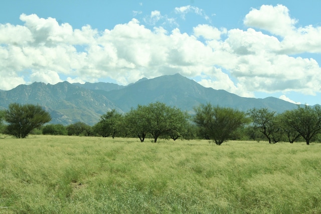 mountain view featuring a rural view