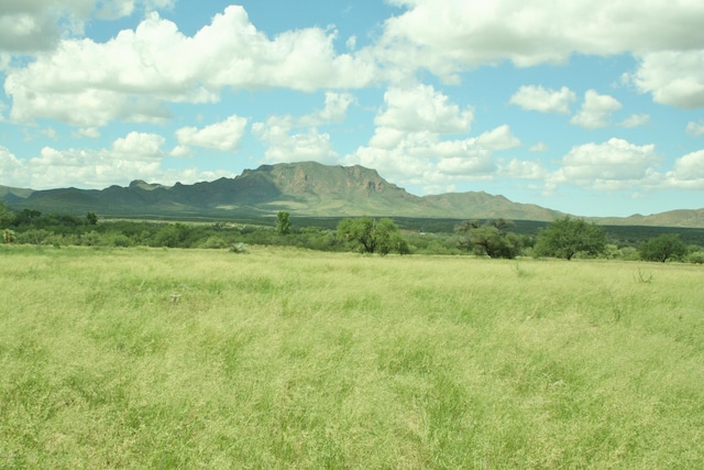 mountain view featuring a rural view