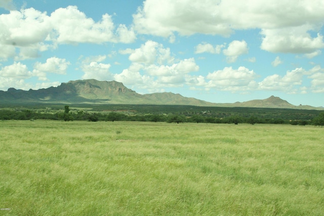 property view of mountains featuring a rural view