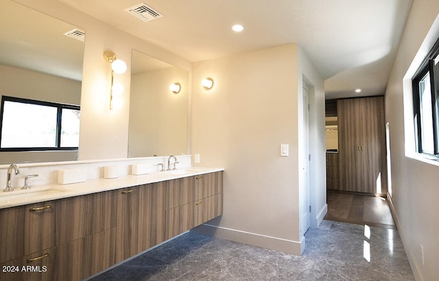 bathroom featuring vanity