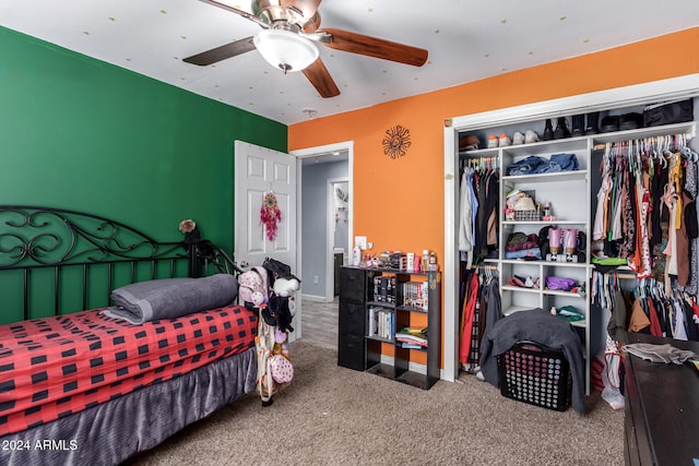 bedroom featuring a closet, ceiling fan, and carpet flooring