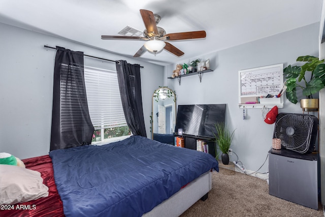 carpeted bedroom featuring ceiling fan