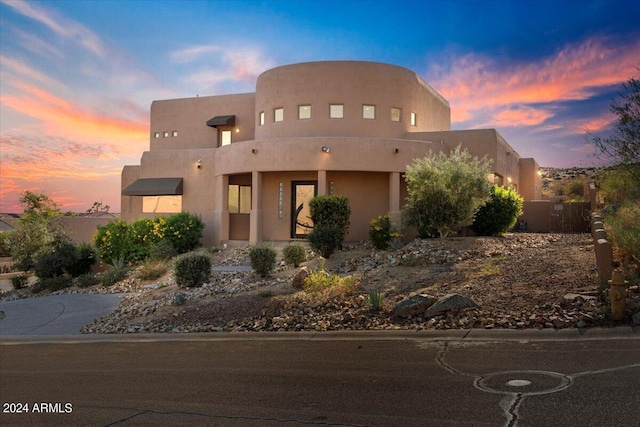 view of adobe home