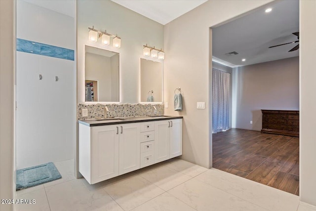 bathroom with vanity, wood-type flooring, and ceiling fan