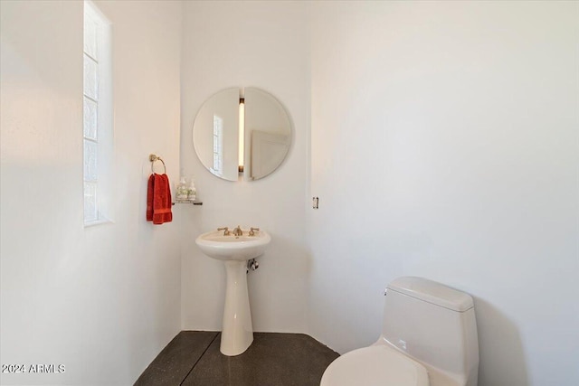 bathroom featuring toilet