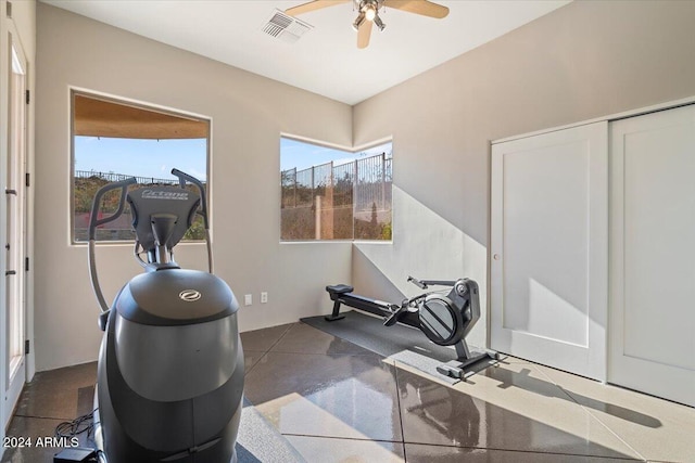 workout area featuring ceiling fan