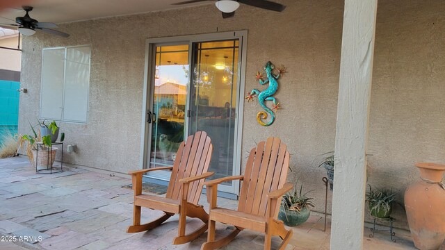 view of patio with ceiling fan