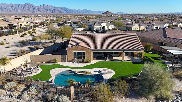 exterior space with a patio area and a mountain view