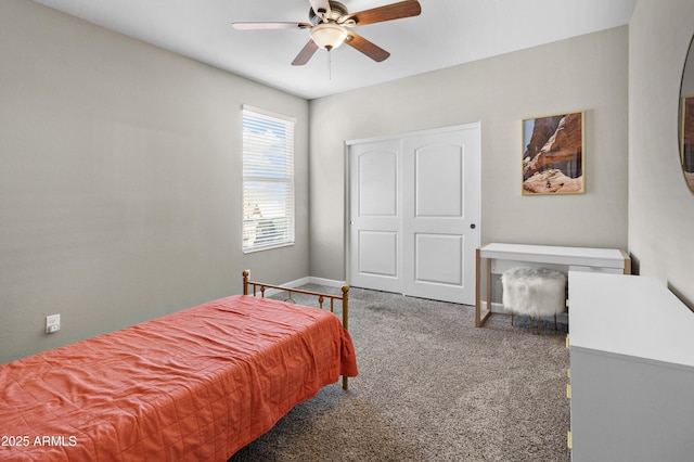 bedroom with ceiling fan and carpet floors