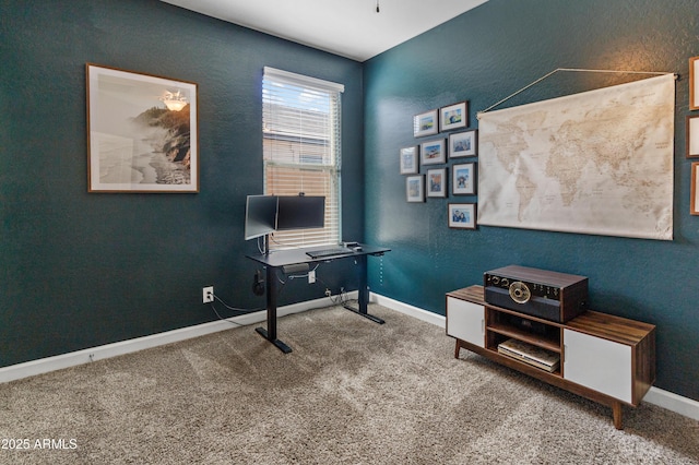 carpeted office with baseboards