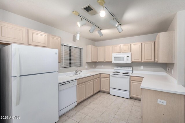 15380 N 100th St Unit 1106, Scottsdale, AZ 85260 - kitchen with white appliances, a sink, light brown cabinets, and light tile patterned floors