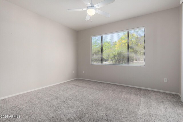 15380 N 100th St Unit 1106, Scottsdale, AZ 85260 - carpeted empty room with baseboards and a ceiling fan