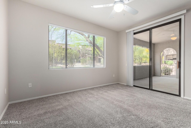 15380 N 100th St Unit 1106, Scottsdale, AZ 85260 - unfurnished room featuring carpet flooring, baseboards, and a ceiling fan