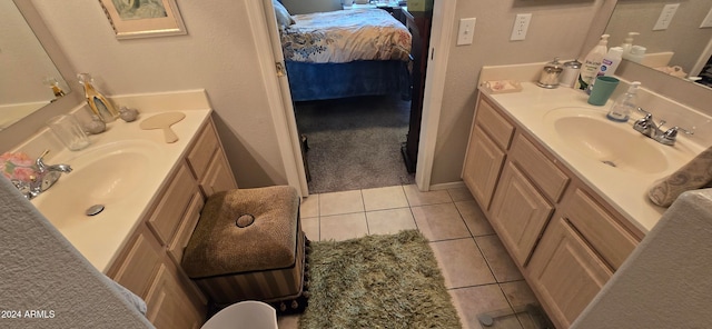 bathroom featuring tile patterned floors and vanity