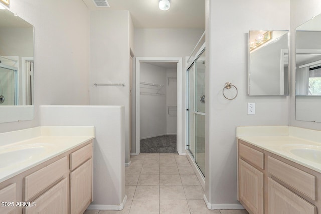 15380 N 100th St Unit 1106, Scottsdale, AZ 85260 - full bath with a stall shower, two vanities, and baseboards