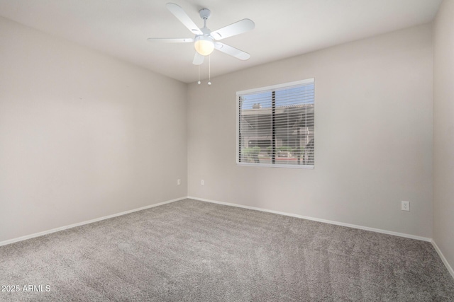 15380 N 100th St Unit 1106, Scottsdale, AZ 85260 - spare room featuring carpet floors, a ceiling fan, and baseboards