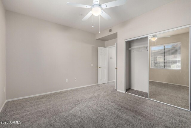 15380 N 100th St Unit 1106, Scottsdale, AZ 85260 - unfurnished bedroom with carpet floors, a closet, a ceiling fan, and baseboards