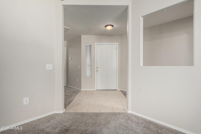 15380 N 100th St Unit 1106, Scottsdale, AZ 85260 - tiled foyer entrance with carpet and baseboards
