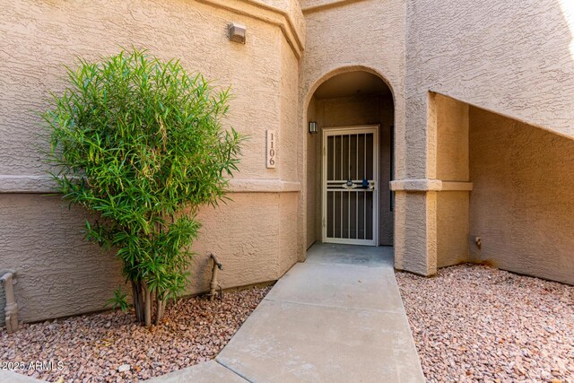 15380 N 100th St Unit 1106, Scottsdale, AZ 85260 - doorway to property featuring stucco siding