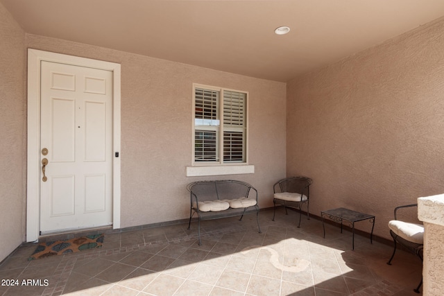 entrance to property with a patio