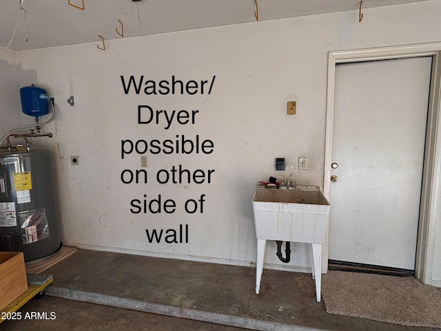 washroom featuring hookup for an electric dryer and water heater