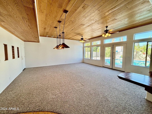 interior space with carpet floors, wooden ceiling, and french doors