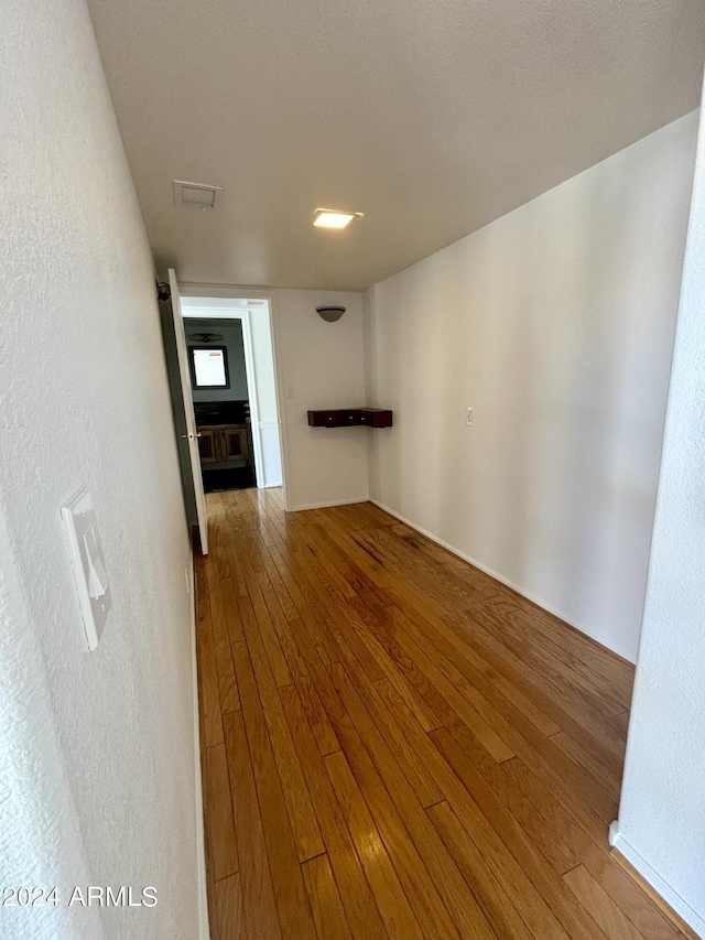 interior space with hardwood / wood-style floors