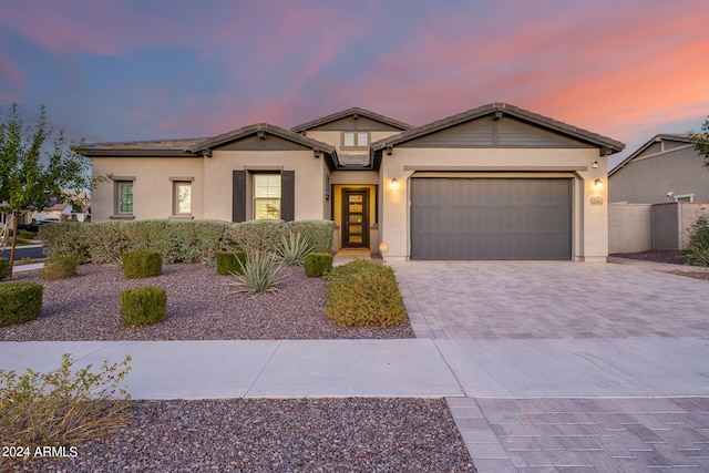 view of front of property featuring a garage